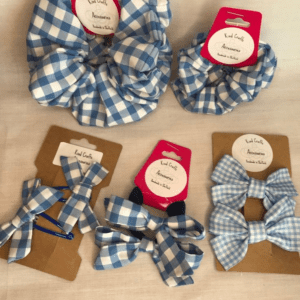 Collection of blue and white gingham check school hair accessories for girls.